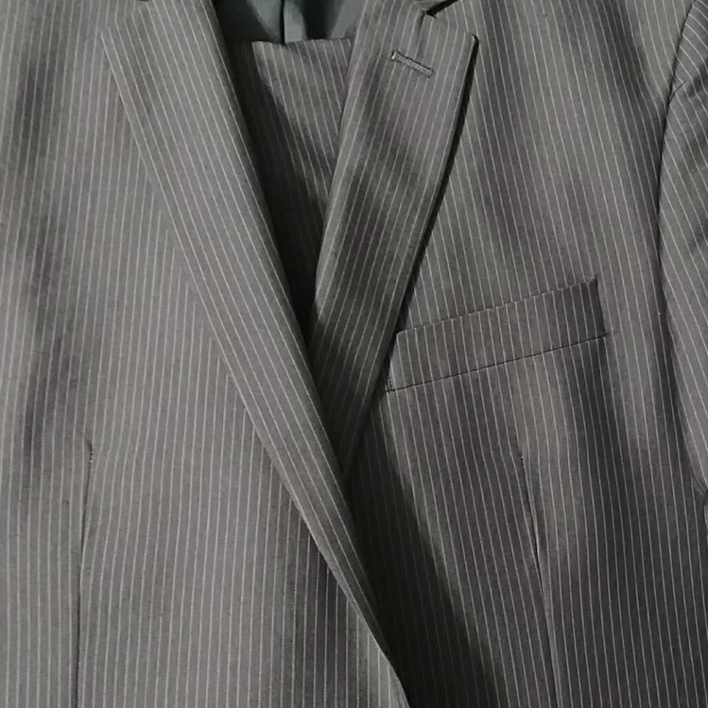 Kenneth Cole suit.